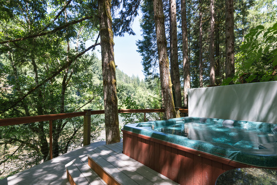 Image 6 person hot tub overlooking the river